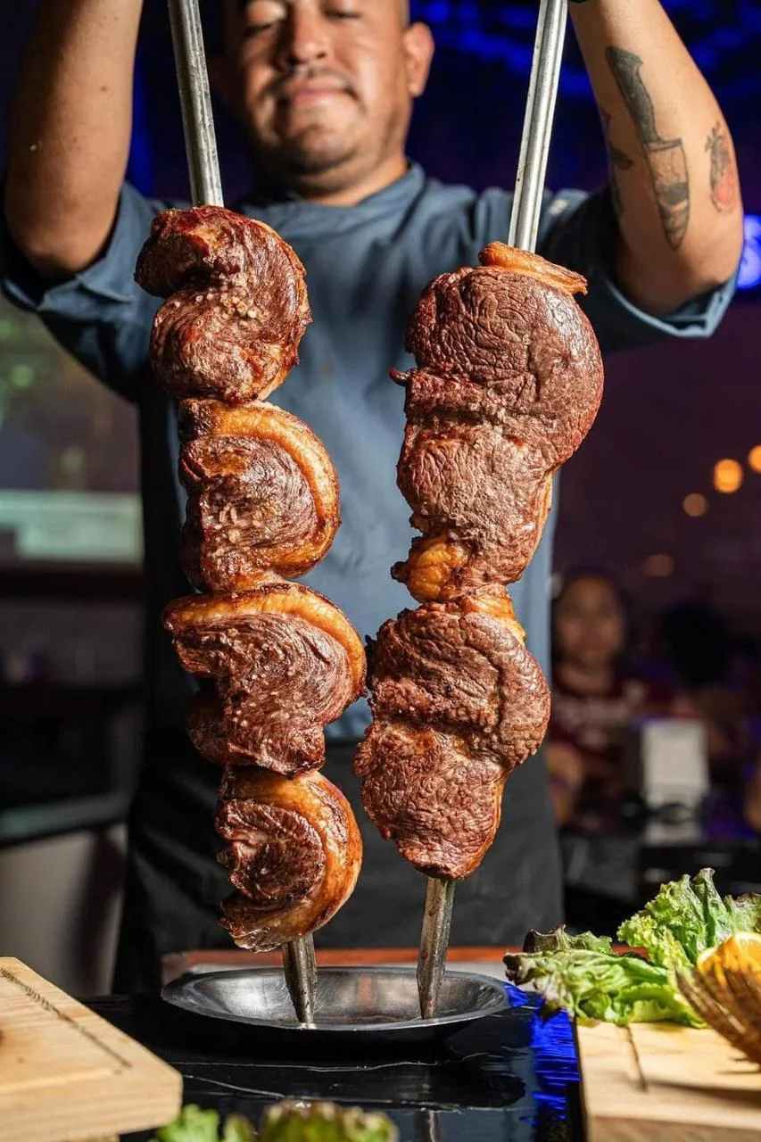 Trabajo real de Churrascaría GM en evento · fotografía 15