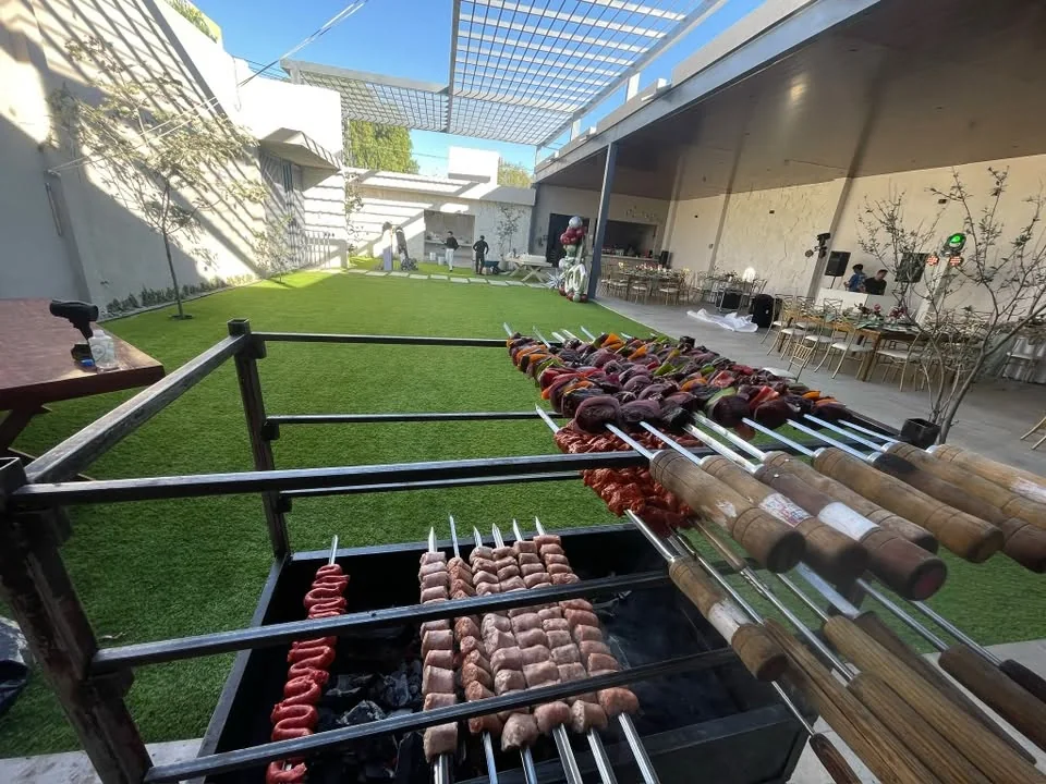 Trabajo real de Churrascaría GM en evento · fotografía 21